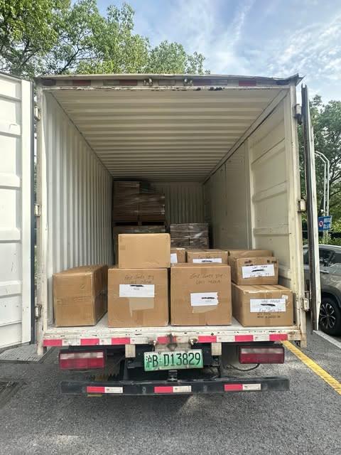 A truck in China loaded with East Gate customer cartons, ready to move